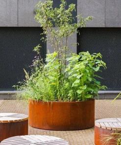 Lav rund højbed / plantekumme i corten stål med hjul - H.40cm