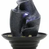 Lille vandspil i Terrazzo look med LED lys