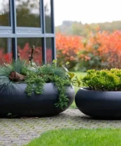 Store runde sorte bowler / lave krukker i fiberstone